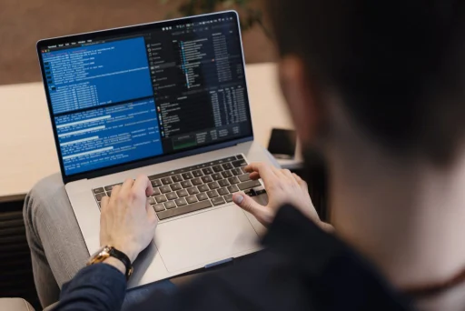 close-up-man-writing-code-laptop-scaled-1-1024&#215;683-1